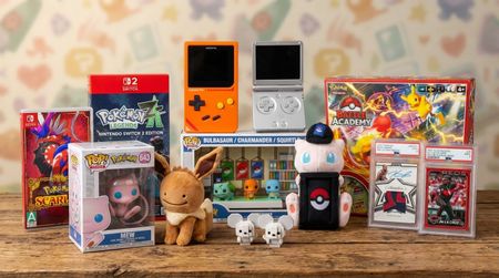 Multiple Pokemon-related products for gift ideas on a wooden table